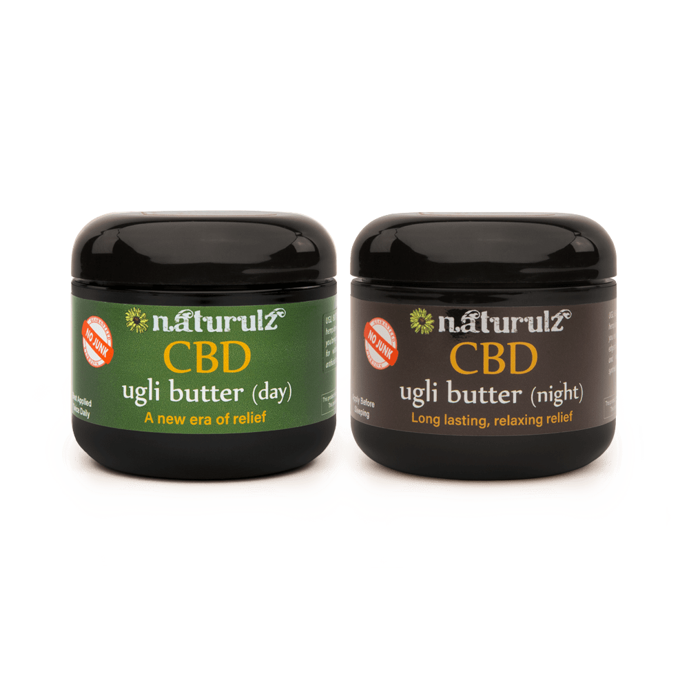 A couple of jars that are sitting on top of a table.