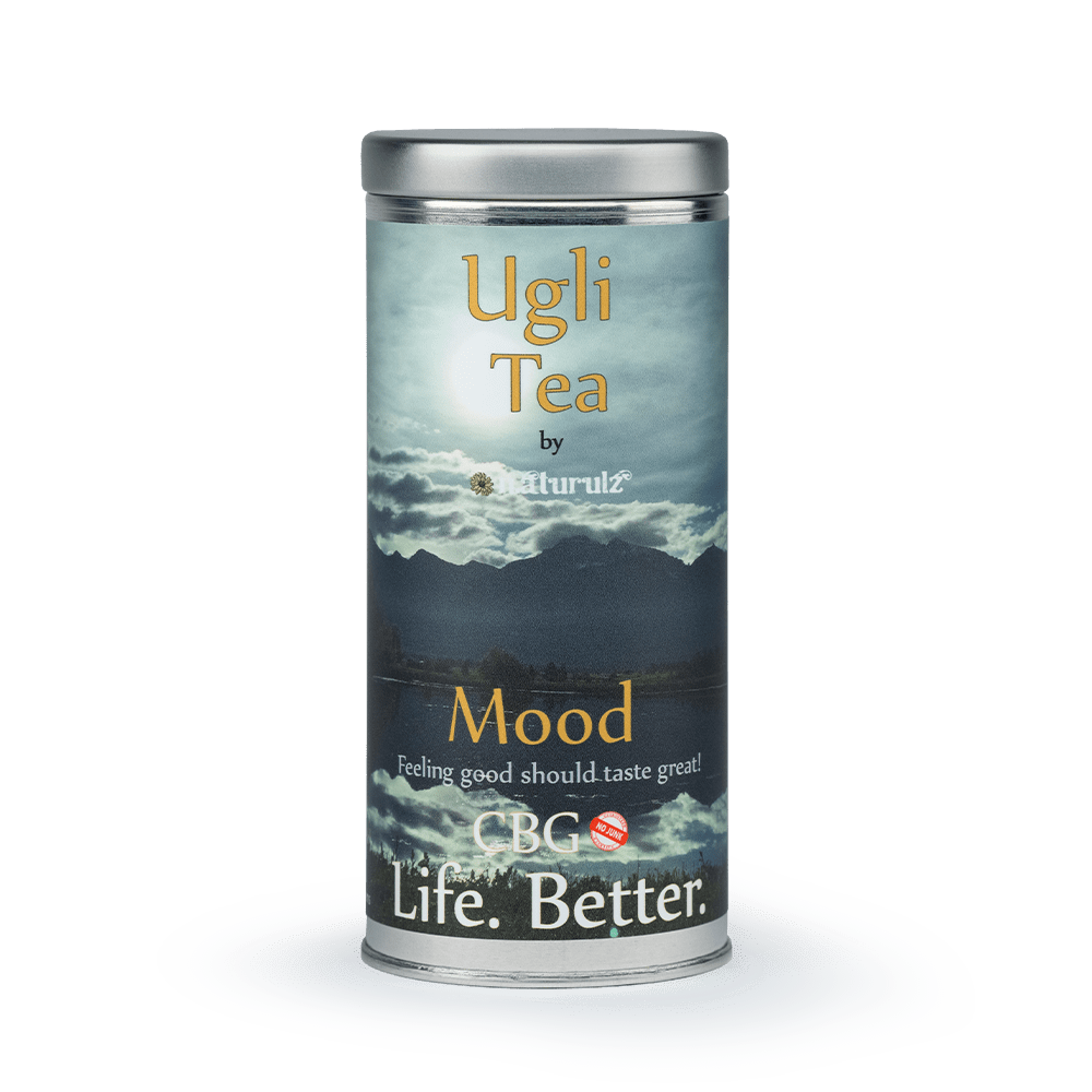 A can of tea on top of a white plate.